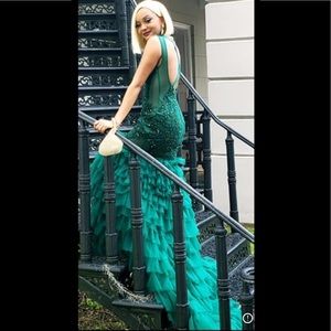 Formal Sequined Ball Gown with a Long Luxury Ruffled Train and Cross-Back